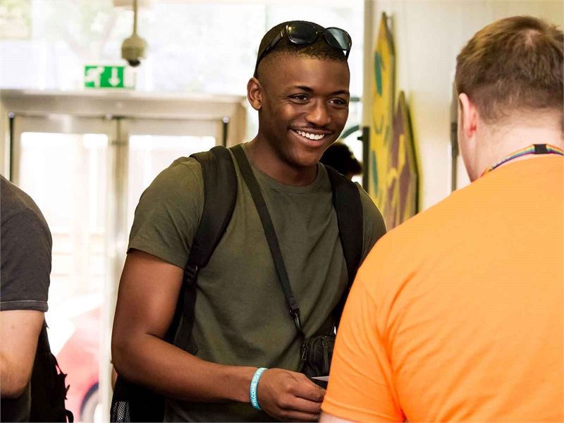 A student talking to a South Bank Students' Union staff member